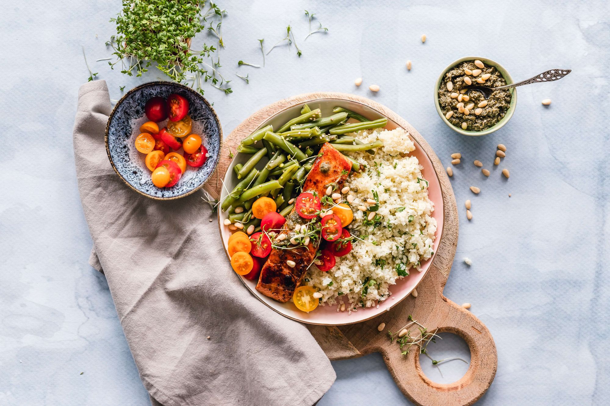 Cauliflower rice with salmon, green beans, and tomatoes - a delicious and healthy meal bursting with flavours!