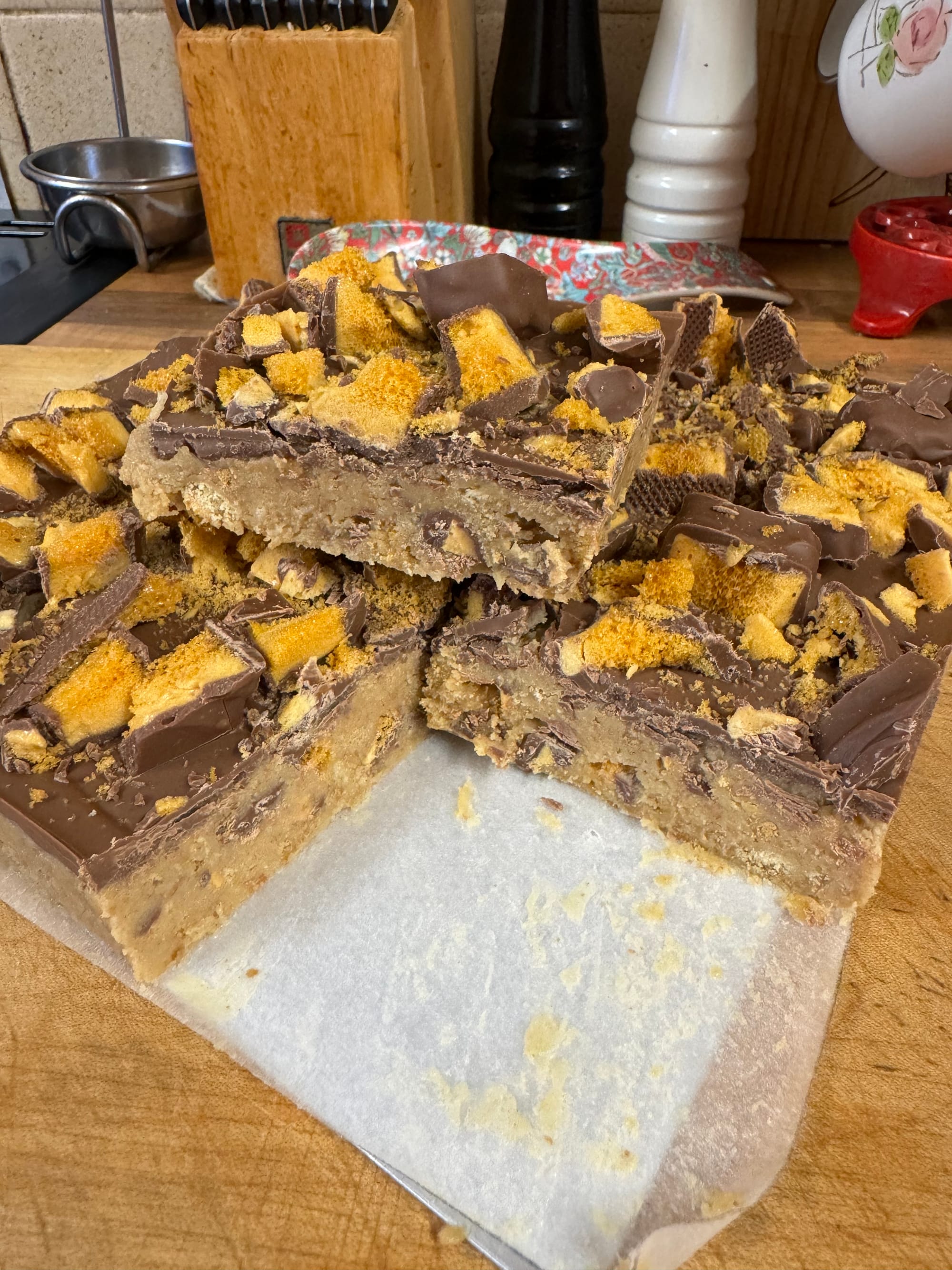 Delicious Crunchie Slice with honeycomb centre, covered in chocolate.