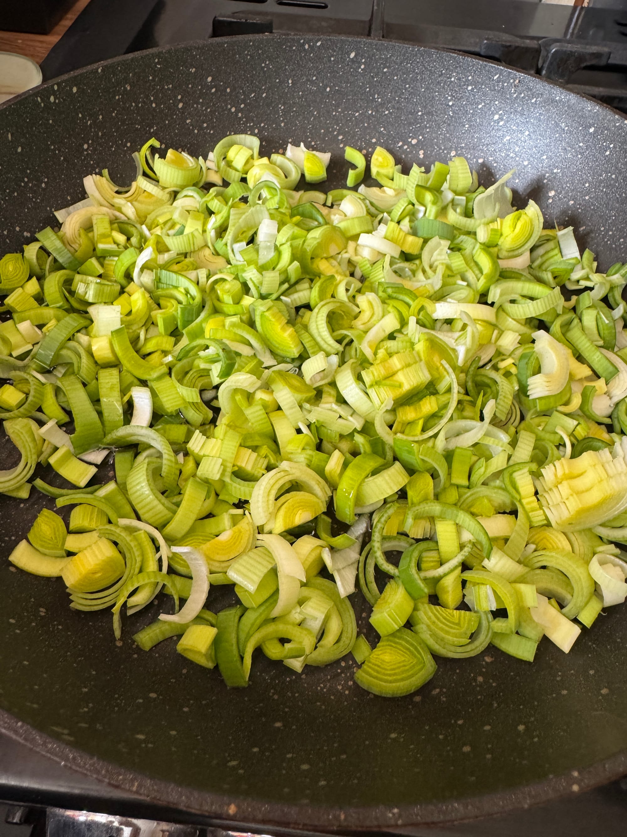 Sautéed leeks in pan