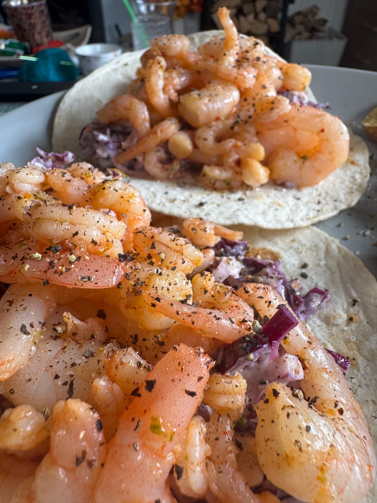 Spicy lime prawn tacos with red cabbage slaw in corn tortillas