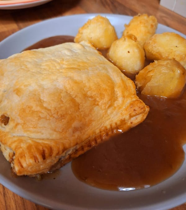 Homemade Christmas Dinner Turnovers with gravy and potatoes