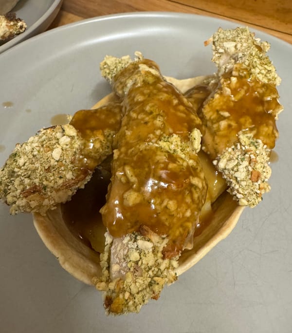 Golden-brown Stuffing Coated Chicken Strips with Gravy