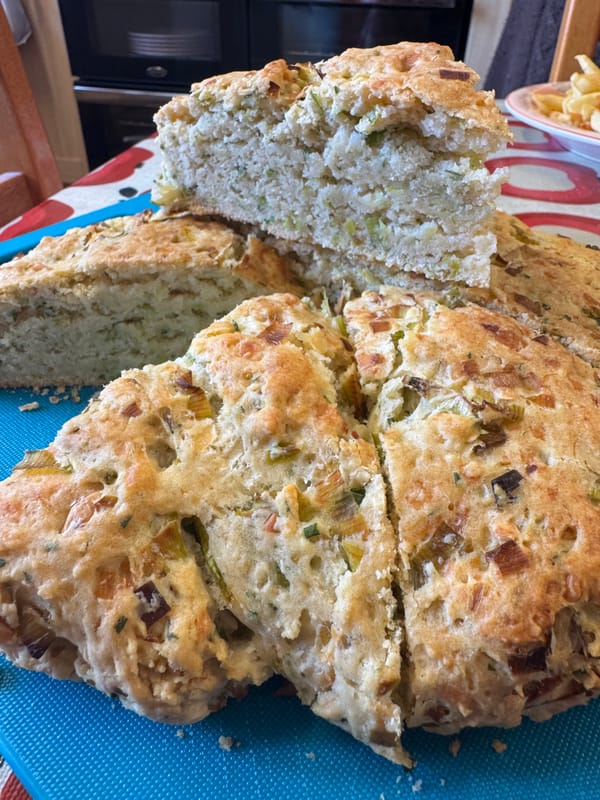 Golden cheese and leek herby bread sliced